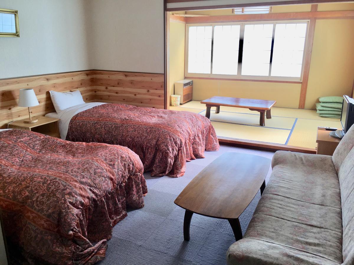 Pension Bergland Кусацу Экстерьер фото